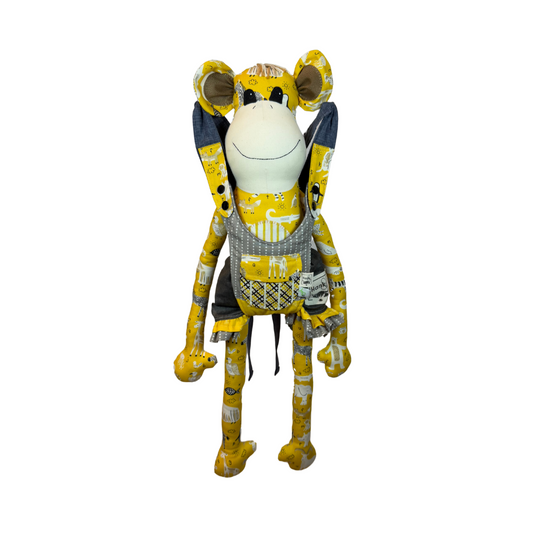 A toy baby carrier with a monkey design, featuring grey and yellow details.